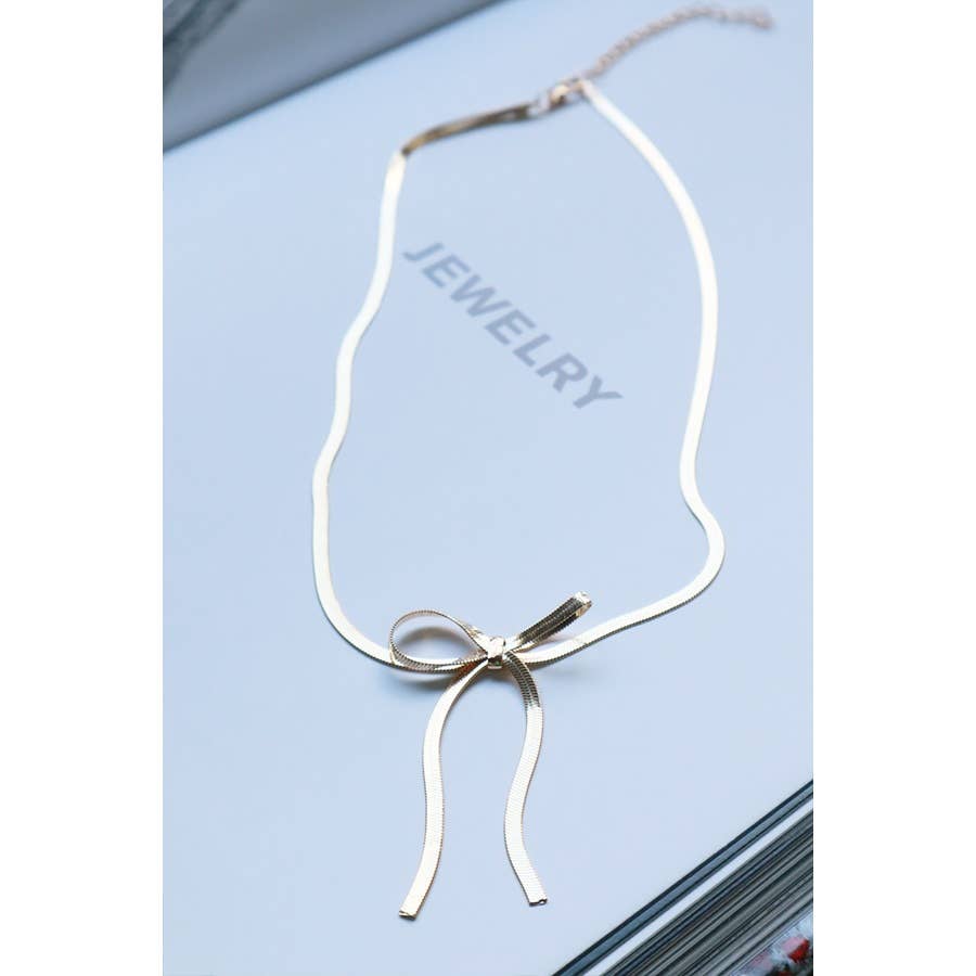 Tessel Chain Bow Necklace